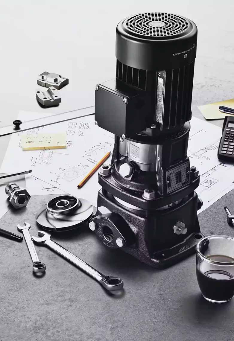 Grundfos pump surrounded by tools