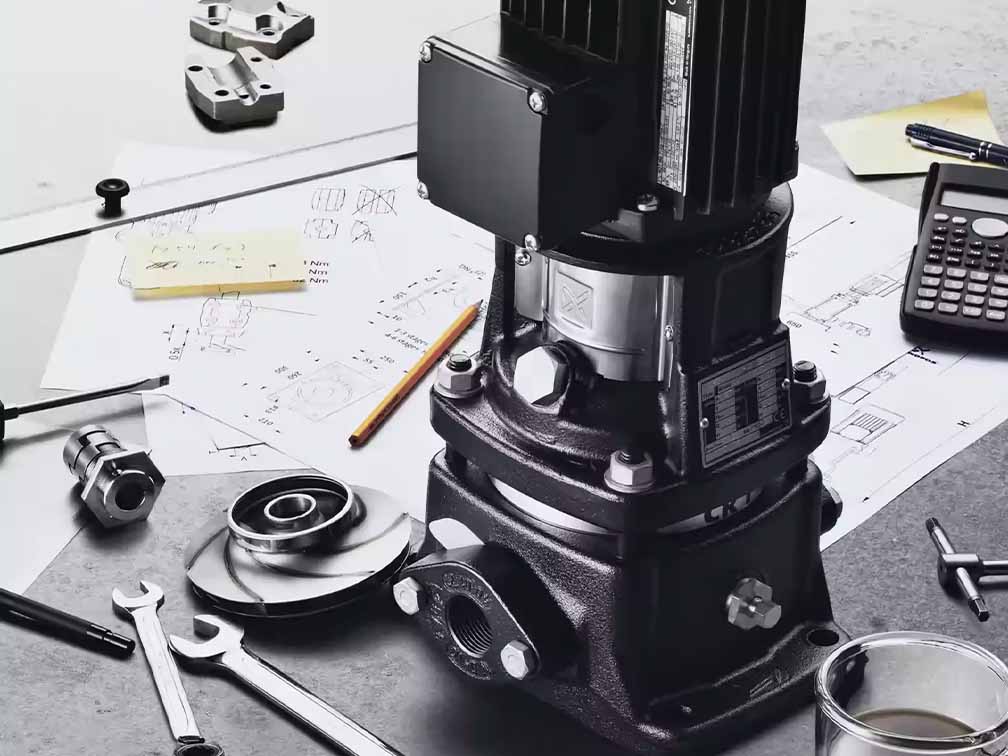 Grundfos pump surrounded by tools